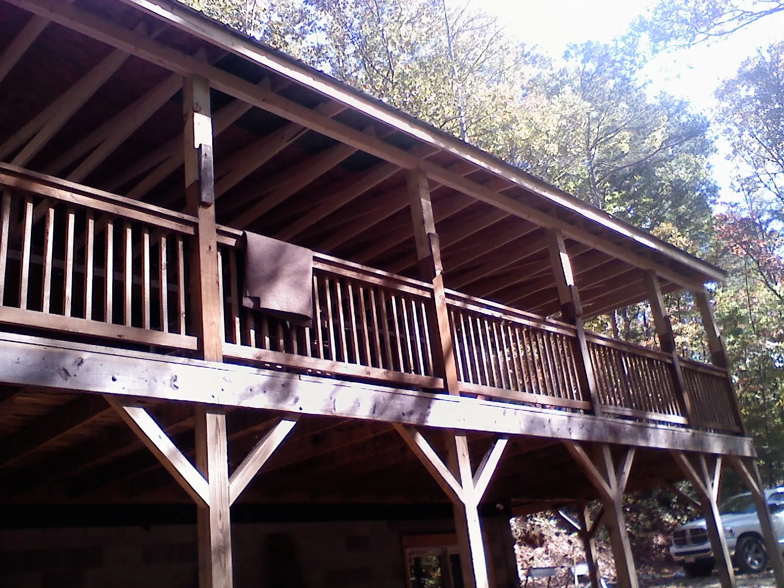 Timber framing under a new elevated porch and deck — Roof Leak Repair in Carver by Roofing Brothers